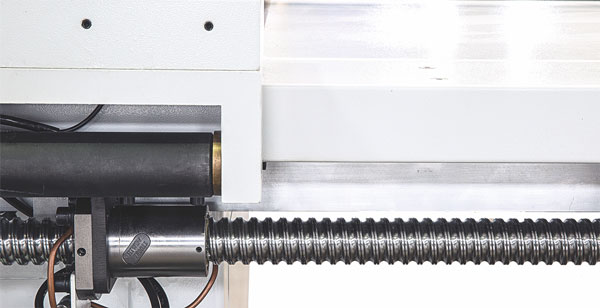 Longitudinal stop with pusher