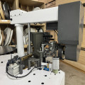 Curvilinear edge banding machine KDT-305MC with milling unit and vacuum clamping of the workpiece for PUR/EVA adhesive