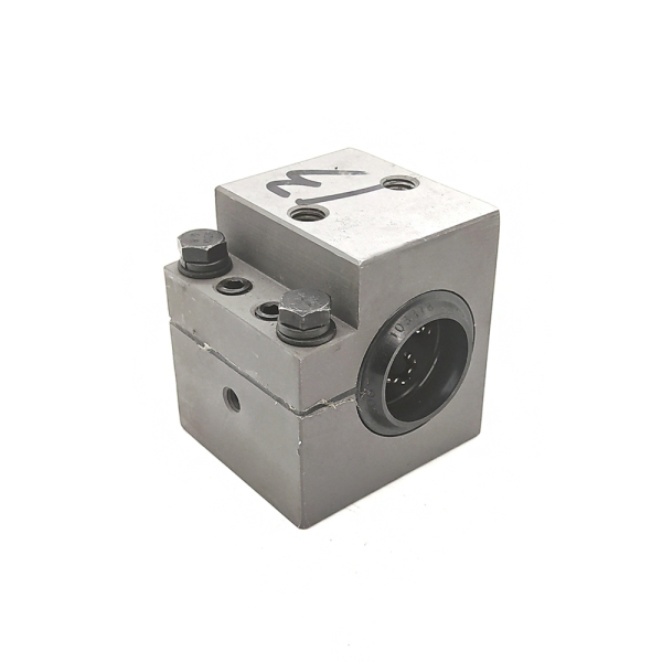 Linear bearing housing for main saw guide of CNC beam saws