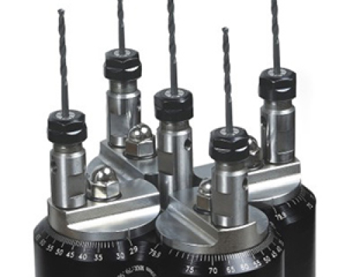 Drilling heads for drilling in metal