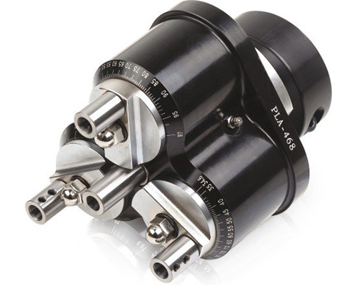 Drilling heads with adjustable spindle spacing