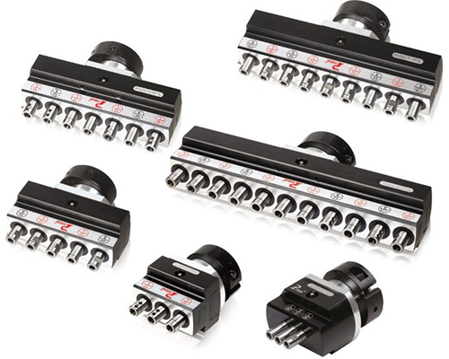 Drilling heads with fixed spindle spacing