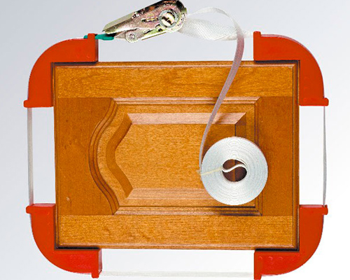 Strap clamps for frames