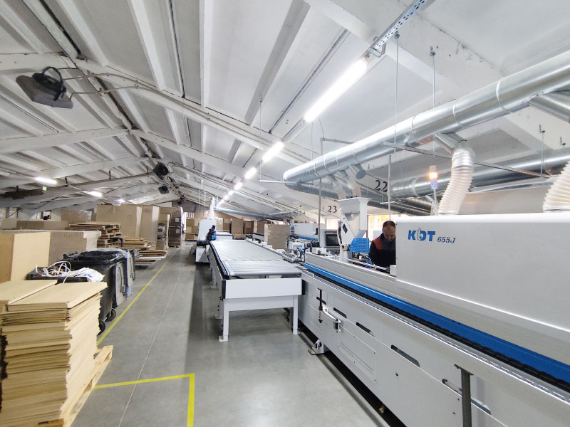 Automatizovaná čtyřstranná olepovací stanice